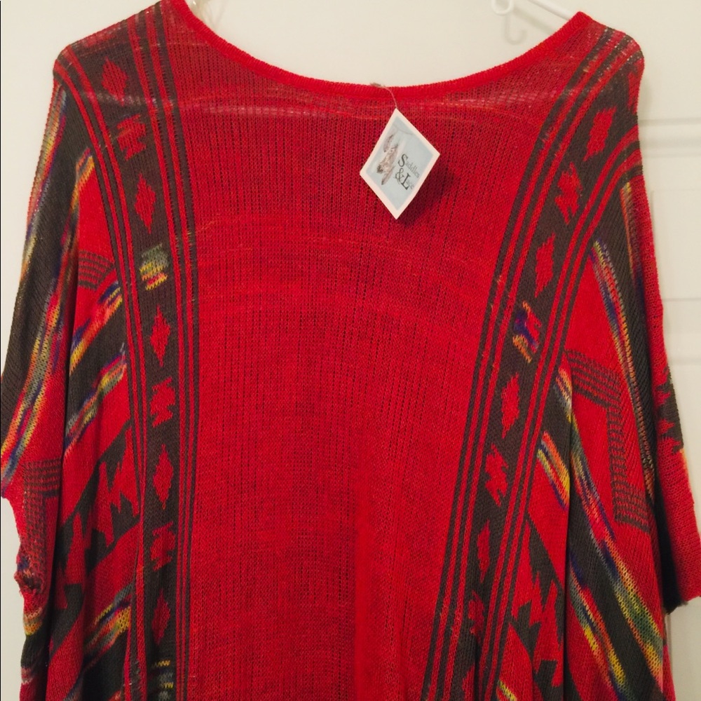 Aztec Red short sleeve pull over. Fits loosely.